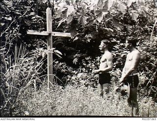 Probably  Astrolabe Bay, Madang, New Guinea, 1945. Dressed in swimming trunks, two officers serving with Headquarters, RAAF Northern Command (NORCOM), Flight Lieutenant Jim Hodges (left) and Dick - ..