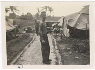 [Serviceman at military camp, Saipan]