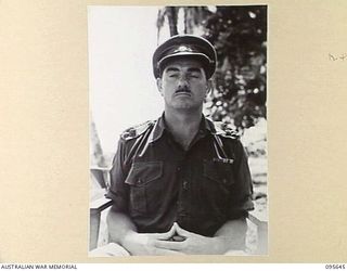 PALMALMAL, JACQUINOT BAY, NEW BRITAIN. 1945-09-01. LIEUTENANT COLONEL A.P. CHAPMAN, ASSISTANT ADJUTANT AND QUARTERMASTER GENERAL HEADQUARTERS 11 DIVISION. HE WAS AN ORIGINAL MEMBER OF AND SERVED ..