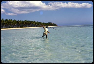 Spearing a fish, Fiji, 1971