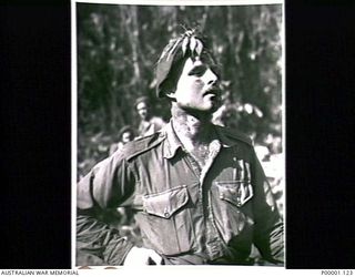 THE SOLOMON ISLANDS, 1945-04-24/27. AN ALERT AUSTRALIAN SOLDIER ON PATROL ON BOUGAINVILLE ISLAND. (RNZAF OFFICIAL PHOTOGRAPH.)