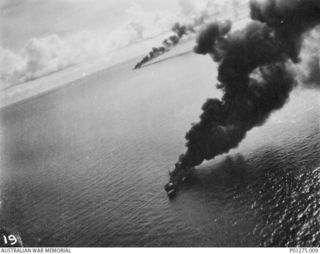 Bismarck Sea. 1943-03-03. Aerial photograph of Japanese shipping on fire after attack by Beaufighter aircraft of No. 30 Squadron RAAF during the Battle of the Bismarck Sea fought about 40 miles ..