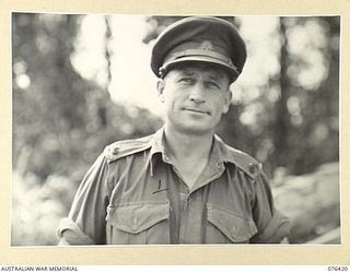 LAE, NEW GUINEA. 1944-10-03. VX39028 MAJOR G.J.S. NELSON, ADMINISTRATION COMMANDER, 12TH FIELD COMPANY, IN THE ABSENCE OF NX8934 MAJOR W.A. DAVEY (MAJOR NELSON IS THE OFFICER COMMANDING 4TH FIELD ..