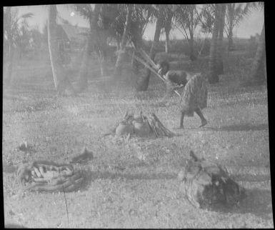 Woman firing pots, Port Moresby, Papua, ca. 1923, 2 / Sarah Chinnery