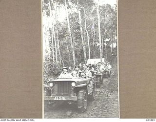 1942-10-08. THE VISITING PARTY TRAVELLED BY "JEEP" FROM THE MAIN BASE TO UNITS STATIONED ALONG THE LIMITED AMOUNT OF TRAFFICABLE ROAD, THE CONDITION OF WHICH CAN BE SEEN CLEARLY IN THE PICTURE. IN ..