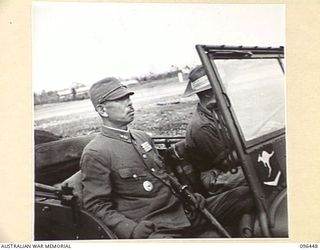 CAPE WOM, NEW GUINEA, 1945-09-13. LIEUTENANT-GENERAL H. ADACHI, COMMANDER 18 JAPANESE ARMY IN NEW GUINEA, ARRIVING IN AN AUSTRALIAN JEEP FOR THE SURRENDER CEREMONY HELD AT CAPE WOM AIRSTRIP. ..