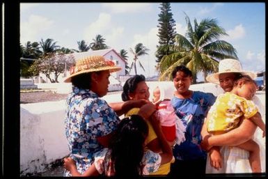 Group of women and children outdoors, Cook Islands