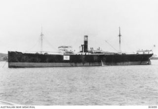 PORT SIDE VIEW OF THE JAPANESE CARGO VESSEL CHINA MARU. SHE TRANSPORTED PART OF THE JAPANESE FORCE WHICH OCCUPIED SALAMAUA ON 1942-03-08. (NAVAL HISTORICAL COLLECTION)