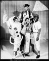 [Four student performers dressed as an astronaut, a cowboy, a baseball player, and a beautiful Indian girl in the "Holiday in the USA" program, 1970]