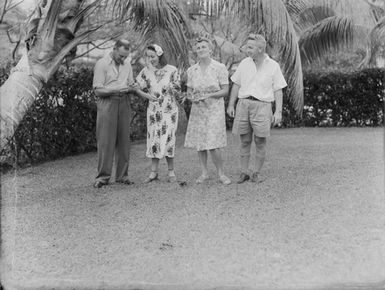 [Portrait of two women and two men]