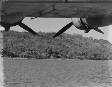 [View of propellers and Pacific island]