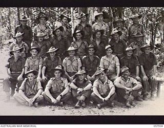 DOBODURA, NEW GUINEA. 1943-10-11. GROUP PORTRAIT OF GENERAL DUTIES STAFF, HEADQUARTERS, 11TH AUSTRALIAN DIVISION. LEFT TO RIGHT:- BACK ROW: NX110986 PRIVATE (PTE) S. TAYLOR; QX29898 LANCE CORPORAL ..