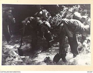 BOUGAINVILLE. 1945-05-17. MEMBERS OF C COMPANY, 57/60 INFANTRY BATTALION, COOLING OFF IN THE HUDA RIVER AFTER A HARD CLIMB IN FULL KIT, DURING THE ADVANCE ALONG COMMANDO ROAD. IDENTIFIED PERSONNEL ..