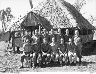 TOROKINA, BOUGAINVILLE. 1945-11-09. A GROUP OF ANGLICAN CHAPLAINS OUTSIDE THE PATTISON CHAPEL, HEADQUARTERS 3 DIVISION