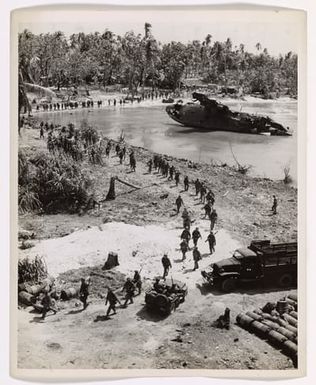 Photograph of a Column of U.S. Troops at Makin