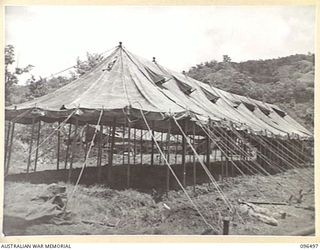 RABAUL, NEW BRITAIN, 1945-09-13. A TENT WARD AT 4 FIELD AMBULANCE. FOLLOWING THE OCCUPATION OF RABAUL AFTER THE JAPANESE SURRENDER BY AN AUSTRALIAN FORCE DRAWN FROM 4 INFANTRY BRIGADE, THE UNIT ..