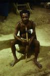 Villager listening to New Guinea candidate in [House of Assembly] election campaign, [Maprik?, Papua New Guinea], 1964