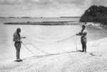 Walter H. Munk and native fisherman, Majuro Atoll, Marshall Islands