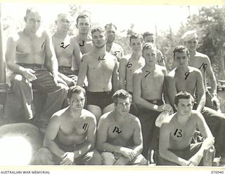 LAE, NEW GUINEA. 1944-11-10. MEMBERS OF THE CREW OF THE AMERICAN LIBERTY SHIP "J.STERLING MORTON" WHICH IS TO TRANSPORT TROOPS OF THE 5TH BASE SUB AREA FROM LAE TO JACQUINOT BAY