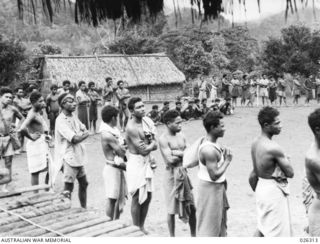 PAPUA, NEW GUINEA. 1942-08. ONE OF THE MAJOR PROBLEMS OF THE CAMPAIGN IN NEW GUINEA IS THE TRANSPORT OF SUPPLIES AND NATIVE CARRIERS HAVE TO BE EMPLOYED TO TRAVERSE THE NARROW PATHS THROUGH THE ..