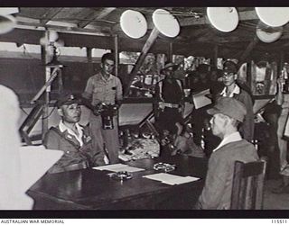 TOROKINA, BOUGAINVILLE. 1945-09-08. LIEUTENANT-GENERAL (LT-GEN) S. G. SAVIGE, GENERAL OFFICER COMMANDING 2 CORPS, ACCEPTED THE SURRENDER OF ALL JAPANESE FORCES ON BOUGAINVILLE FROM LT-GEN M. KANDA, ..