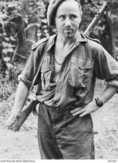 FAITA AREA, NEW GUINEA.1944-01-07. VX38890 CAPTAIN D. ST. A. DEXTER OF FOOTSCRAY, VIC, COMMANDING OFFICER OF A TROOP AND OF THE 2/2ND COMMANDO SQUADRON RETURNING FROM AN EIGHT DAY PATROL THROUGH ..