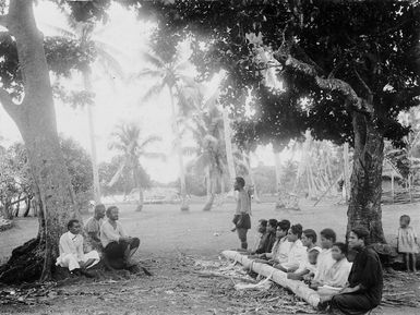 Martin, Josiah, 1843-1916 : Beating bark for tapa making, in Tonga