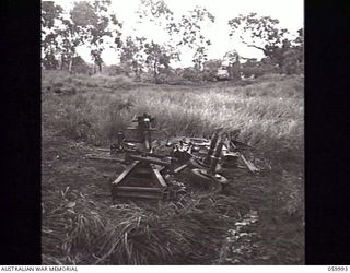 PORT MORESBY, NEW GUINEA. 1943-11-15. A "SHORT" 25-POUNDER GUN OF THE 2/5TH AUSTRALIAN FIELD REGIMENT STRIPPED DOWN TO ITS COMPONENT PARTS AND READY FOR DESPATCH TO ANY AREA