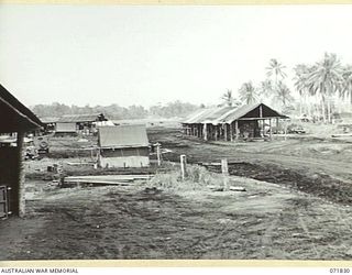 LAE, NEW GUINEA. 1944-03-29. OFFICES AND STORE ROOMS WITHIN THE AREA OF THE 43RD FIELD ORDNANCE DEPOT