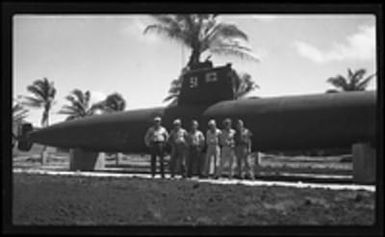 [Servicemen with captured Japanese Type A Kō-hyōteki-class submarine]