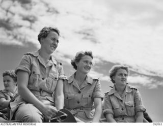 LAE, NEW GUINEA. 1945-05-19. SIGNALWOMEN M. SAW (1), CORPORAL G.M. BENNETT (2), AND SIGNALWOMAN T. POTTER (3), AUSTRALIAN WOMEN'S ARMY SERVICE PERSONNEL ON A LAUNCH TRIP FROM LAE TO SALAMAUA ..