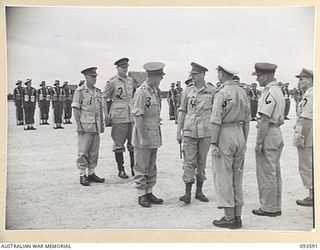 JACQUINOT BAY, NEW BRITAIN. 1945-07-01. HIS ROYAL HIGHNESS, THE DUKE OF GLOUCESTER, GOVERNOR-GENERAL OF AUSTRALIA (4), WITH MAJOR GENERAL H.C.H. ROBERTSON, GENERAL OFFICER COMMANDING 5 DIVISION ..