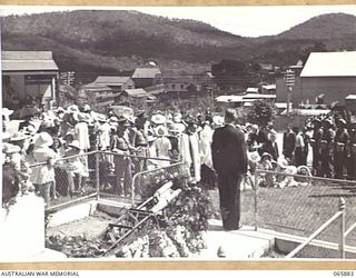 HERBERTON, QLD. 1944-04-25. THE GENERAL OFFICER COMMANDING (GOC), 6TH DIVISION, VX17 MAJOR-GENERAL J.E.S. STEVENS, DSO., ED. (1), AND HIS AIDE-DE-CAMP, WERE SPECTATORS AT THE ANZAC DAY SERVICE AT ..