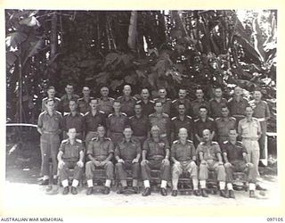 BOUGAINVILLE. 1945-09-26. MAJOR GENERAL W. BRIDGEFORD, GENERAL OFFICER COMMANDING 3 DIVISION, WITH HIS UNIT COMMANDERS