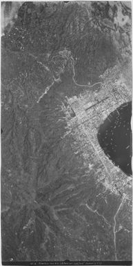 [Aerial photographs relating to the Japanese occupation of Rabaul and vicinity, Papua New Guinea, 1943] : [Simpson Harbour and Tavurvur volcano]