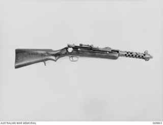 CANBERRA, AUSTRALIAN CAPITAL TERRITORY. 1957-05-03. A JAPANESE SUB MACHINE GUN CAPTURED BY MAJOR D.G. KENNEDY, DSO, DURING A CLASH BETWEEN HIS 10 TON SCHOONER, "DADAVATA" AND A JAPANESE PATROL IN A ..