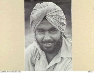 PORT MORESBY, NEW GUINEA. 1944-05-31. SEPOY DIDAH SINGH, (1), 5/11TH SIKH REGIMENT, FROM THE PUNJAB PROVINCE, AT THE NEW GUINEA DETAILS DEPOT. SINCE RELEASE FROM JAPANESE CAPTIVITY BY AMERICAN ..