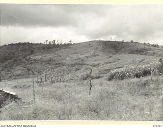 FINSCHHAFEN AREA, NEW GUINEA, 1944-03-17. THE 3,600 FEET FEATURE TO THE LEFT, AND THE 3,200 FEET FEATURE ON THE RIGHT PICTURED VIEWING NORTH WEST FROM SATTELBERG