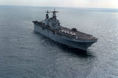 A starboard bow view of the amphibious assault ship USS SAIPAN (LHA-2) during maritime interdiction operations