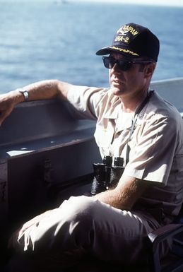 CAPT J. W. Renard, commanding officer, relaxes for a moment aboard the amphibious assault ship USS SAIPAN (LHA-2) during exercise Ocean Venture '81