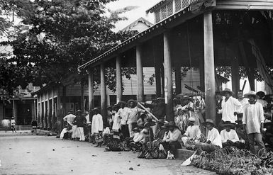 Group at a market place, Papeete, Tahiti
