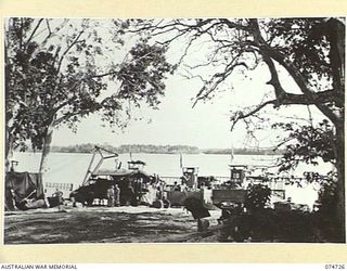 MADANG, NEW GUINEA. 1944. BARGES DRAWN UP ON THE BEACH FOR REPAIR AT THE 593RD UNITED STATES BARGE COMPANY REPAIR WORKSHOPS