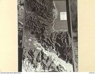 PORT MORESBY, NEW GUINEA. 1944-01-18. AN OPERATIONAL RELIEF MAP OF THE DUMPU MADANG AREA CONSTRUCTED AT HEADQUARTERS, NEW GUINEA FORCE, BY NX101188 LIEUTENANT H.A. KILBY, G.S.I. (T). THIS CONTOUR ..