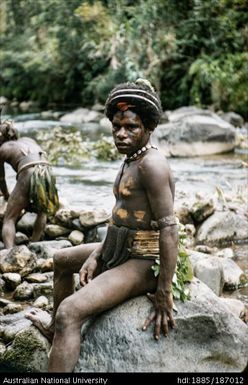 Man sitting on rock