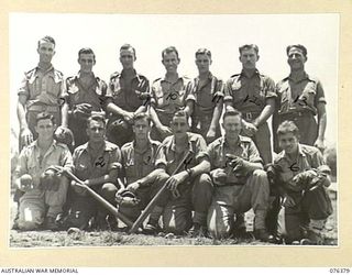 LAE, NEW GUINEA. 1944-10-03. MEMBERS OF THE SOFTBALL TEAM OF HEADQUARTERS, 6TH INFANTRY BRIGADE. IDENTIFIED PERSONNEL ARE:- N268213 PRIVATE R. GOTTAAS (1); VX107445 PRIVATE A.W. JOHNSON (2); ..