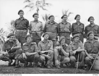 MILILAT, NEW GUINEA. 1944-09-12. OFFICERS OF THE 2/4TH ARMOURED REGIMENT. IDENTIFIED PERSONNEL ARE: NX136171 CAPTAIN E.H. HUMPHRIES (1); SX14570 LIEUTENANT R.B. WILLMOTT (2); VX76955 CAPTAIN W.N. ..