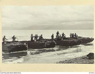 LAE, NEW GUINEA. 1944-03-30. DUKSW (LANDING CRAFT MECHANIZED), OF AMPHIBIOUS PLATOON, 151ST GENERAL TRANSPORT COMPANY, RETURN TO BEACH AFTER COMPLETING THE SIX MILE RETURN JOURNEY FORM LAE TO LABU ..