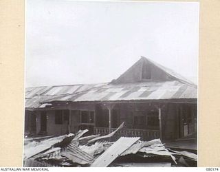 FINSCHHAFEN, NEW GUINEA. 1944-07-02. THE EXTERIOR OF THE MISSION SCHOOL SITUATED AT THE TOP OF SATTELBERG