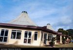 Cook Islands - Yellow building with curved roof