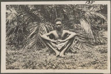 Police boy without his uniform, New Britain Island, Papua New Guinea, probably 1916